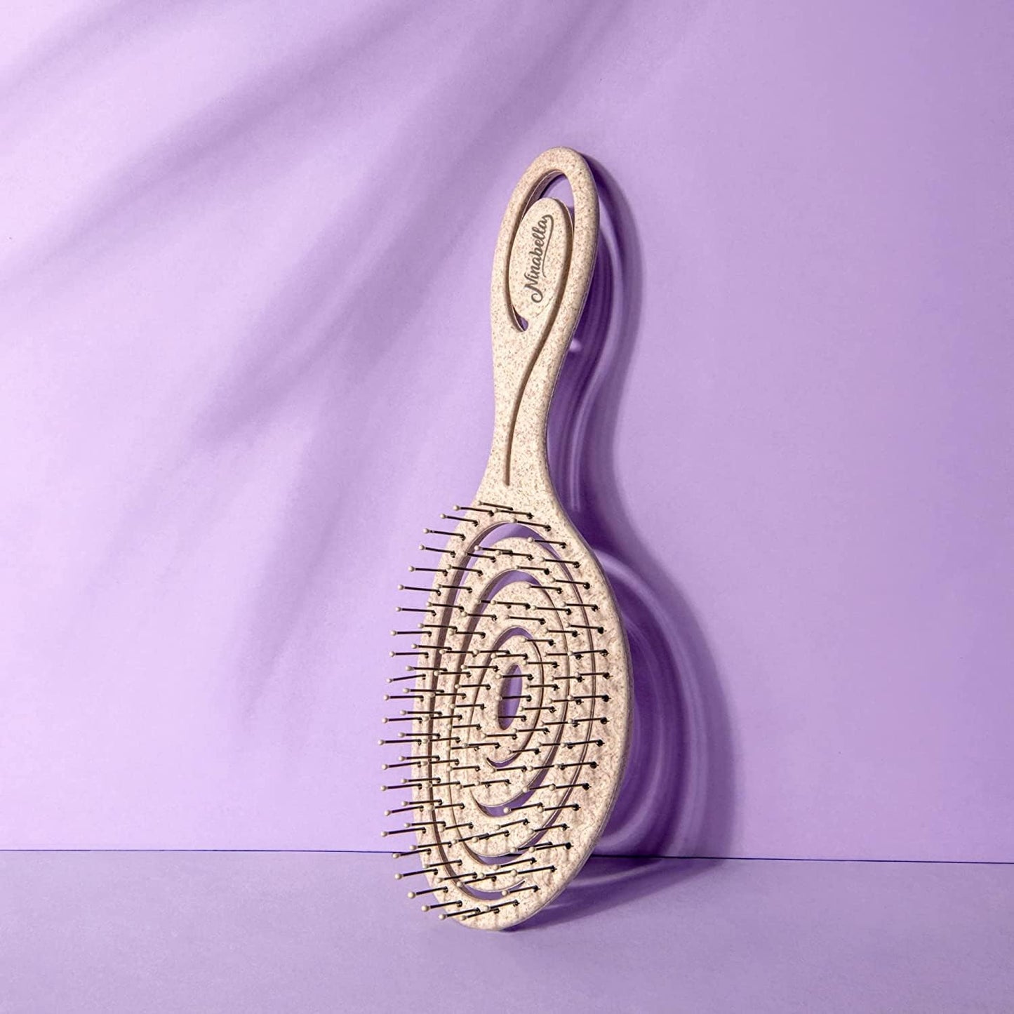 Ninabella Haarbürste ohne Ziepen für Damen, Herren & Kinder - Entwirrbürste auch für Locken & Lange Haare - Einzigartige Profi Detangler-Bürste mit Spiralfeder - Schwarz