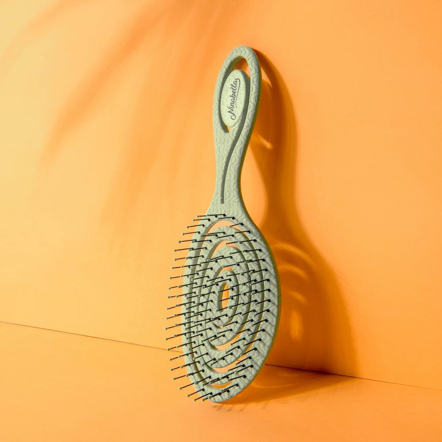 Ninabella Haarbürste ohne Ziepen für Damen, Herren & Kinder - Entwirrbürste auch für Locken & Lange Haare - Einzigartige Profi Detangler-Bürste mit Spiralfeder - Schwarz