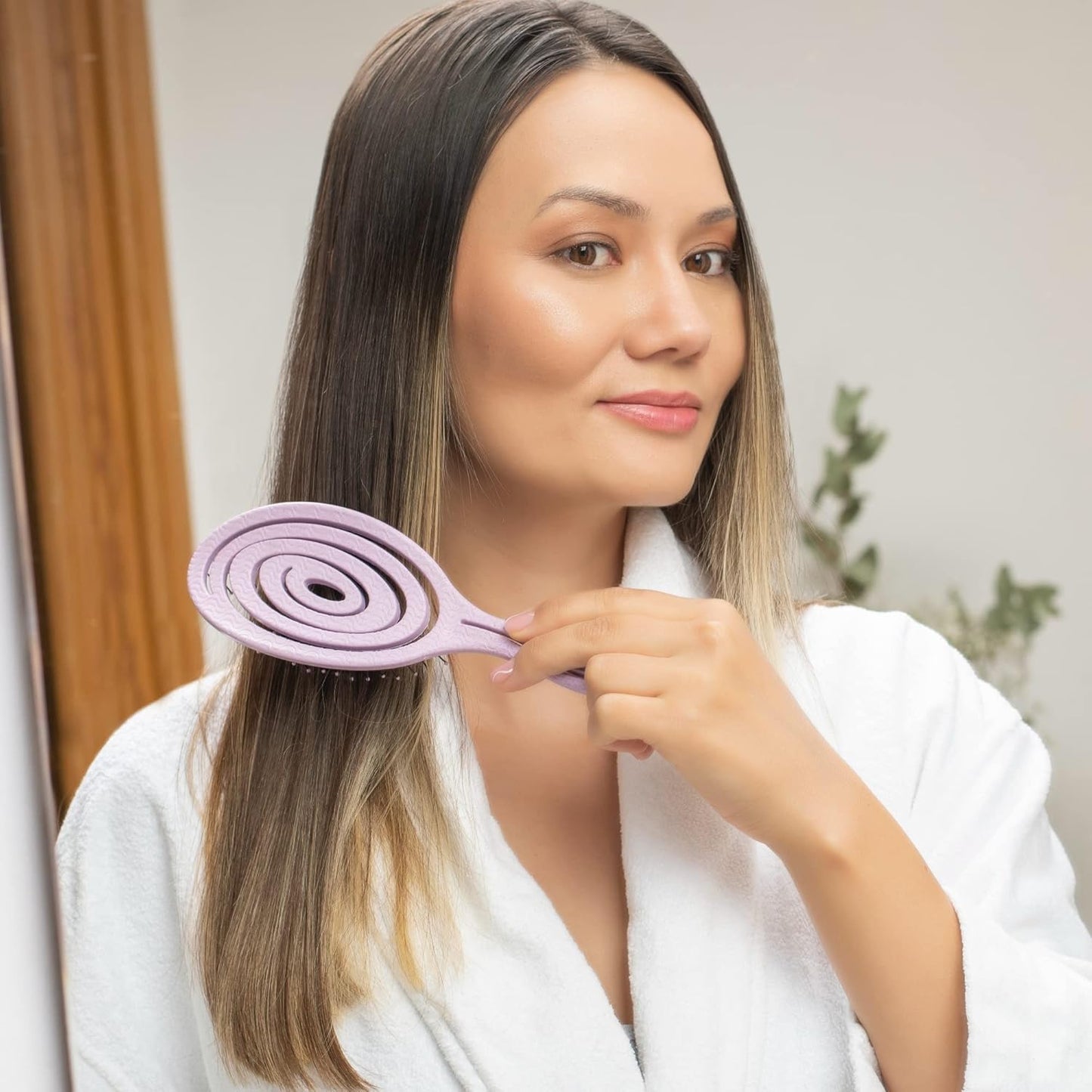 Ninabella Haarbürste ohne Ziepen für Damen, Herren & Kinder - Entwirrbürste auch für Locken & Lange Haare - Einzigartige Profi Detangler-Bürste mit Spiralfeder - Schwarz